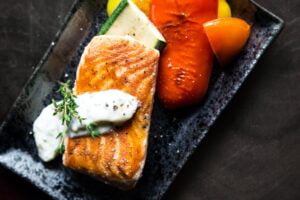 Grilled Salmon Fish on Top of Grilled Vegetables | foods that lower cortisol | Magnesium-Rich foods
