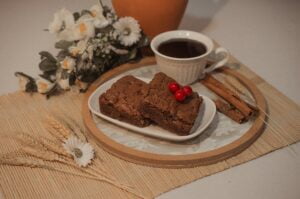 gluten-free brownies and Cinnamon Sticks Beside Cup of Coffee
