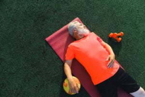 man lying flat on mat | Kegel Exercises for men