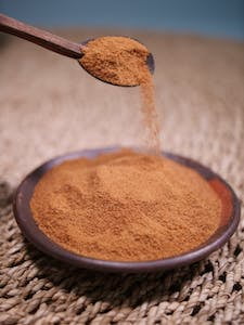 Close-up of a Brown Powder | fulvic acid, fulvic acid soak, fulvic acid bath, fulvic acid soak recipe