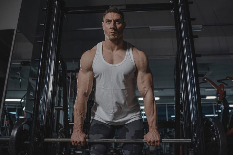 Man in White Tank Top Lifting Weights | | Post Cycle Therapy (PCT)