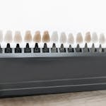 Lined Up Veneers on Display | placeholder for Teeth Bonding vs Veneers