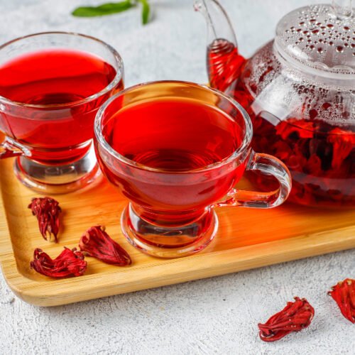 hibiscus tea in 2 cups and a jug | placeholder for hibiscus tea recipe