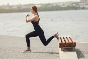 woman doing Bulgarian Split Squat | Forget Crunches: The Single Best Exercise for Bulletproof Core, Killer Quads & Powerful Hips (You're Missing This!)