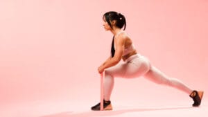 fit woman doing lunges with resistance band | Trainer's Secret: 5 Resistance Band Moves For Full-Body Strength (No Gym Needed!)