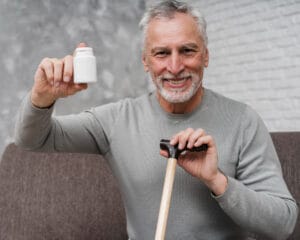 elderly man taking supplements | New Hope for Alzheimer's? This Popular Supplement Shows Surprising Promise in Latest Study