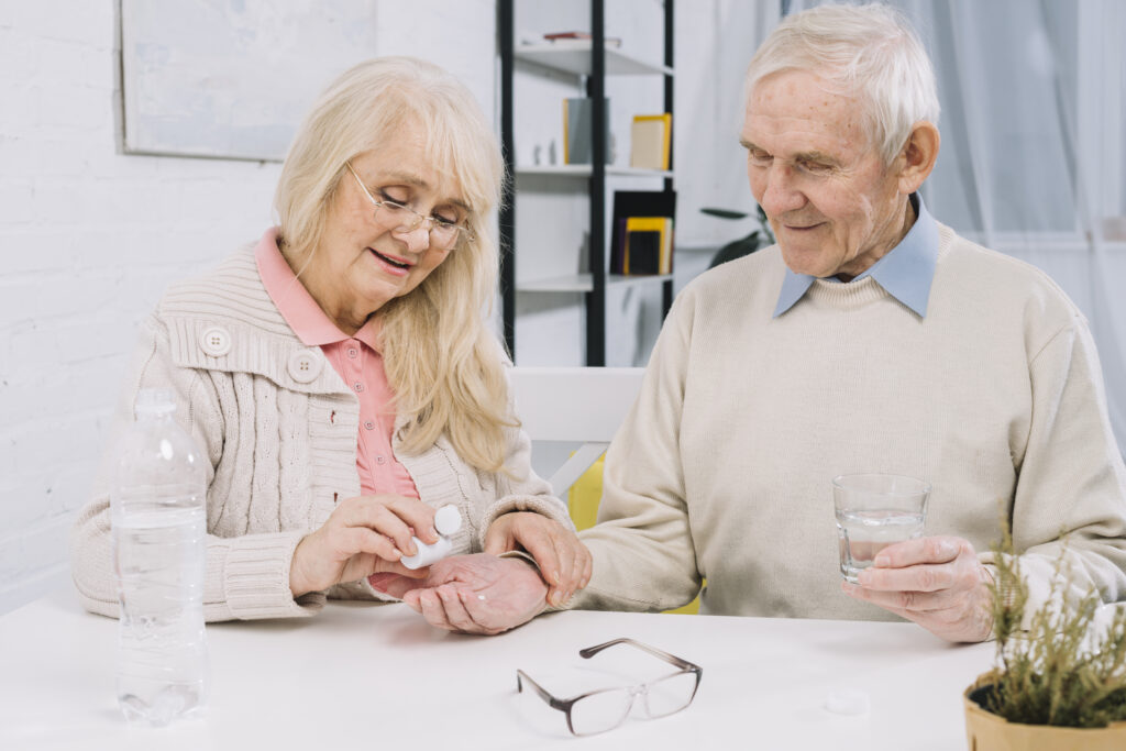 senior couple using pills | Your Daily Magnesium: Could It Slash Your Colon Cancer Risk? Doctors Weigh In!
