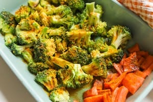 A delightful and vibrant roasted broccoli and carrots dish seasoned to perfection, ideal for health enthusiasts. | Reverse Prediabetes: A Dietitian's 5 Must-Eat Foods for Stable Blood Sugar