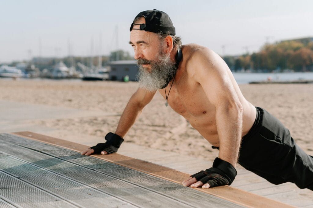 Fit senior man doing push ups