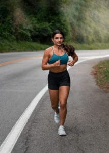 fit woman running outdoors