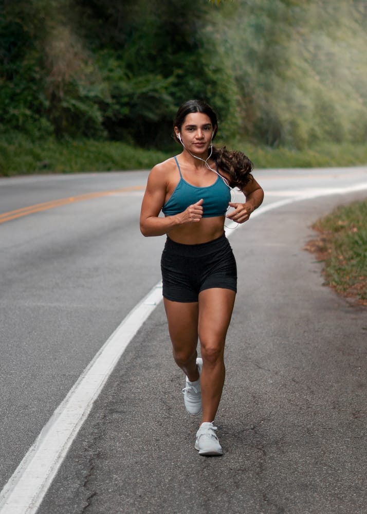 fit woman running outdoors