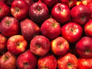 A vibrant collection of fresh red apples showcasing healthy abundance.