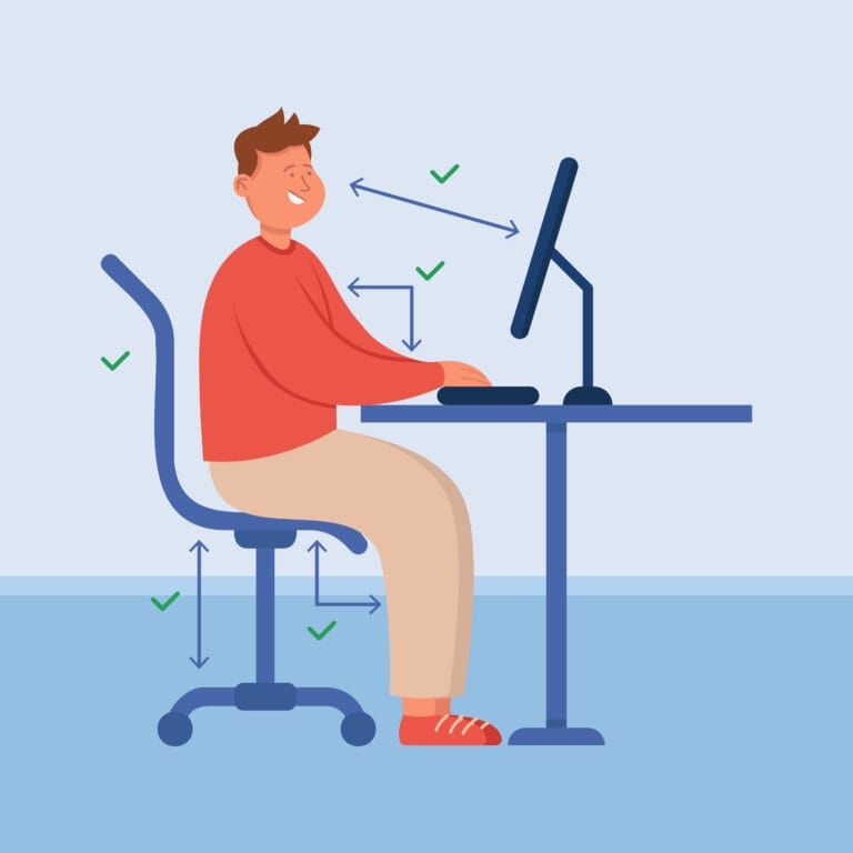 Office person with correct posture sitting at computer desk