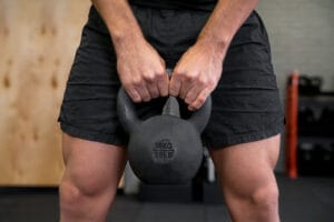 man doing a kettlebell workout