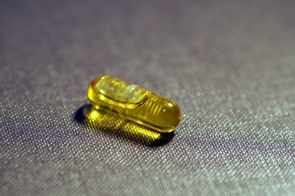 pill, capsule, medicine, medical, yellow, fish oil, vitamin d, get sick, pharmacy, medicines, heal, to prevent, health, pills, vitamin d, vitamin d, vitamin d, vitamin d, vitamin d