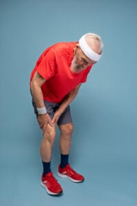 elderly man with knee pain