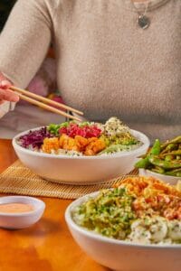 Delicious Asian bowls served in Monterrey with vibrant colors and fresh ingredients.