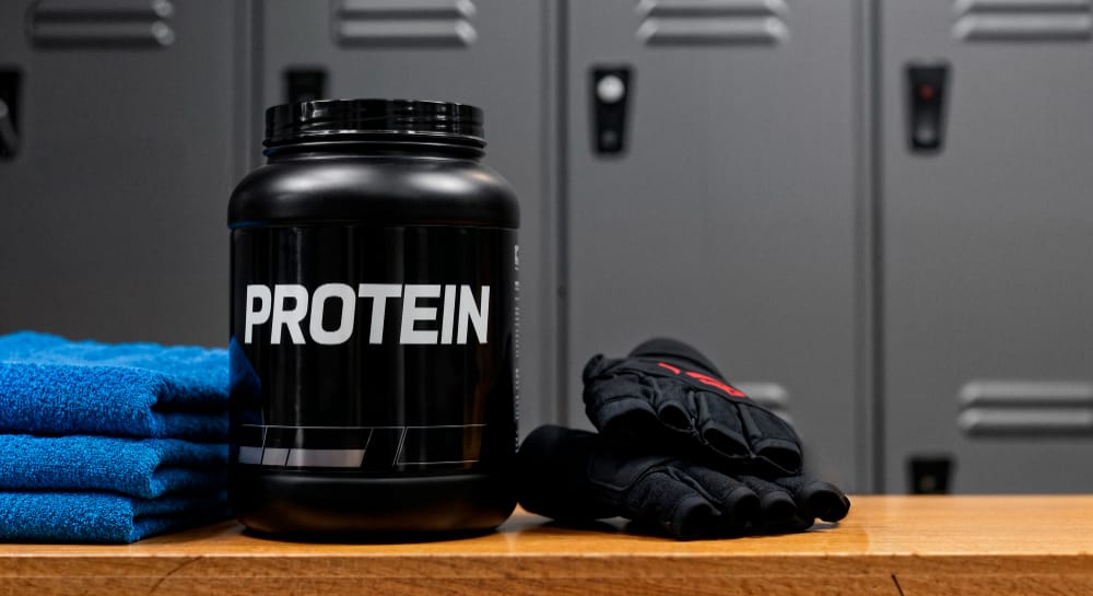 sealed protein powder in the gym