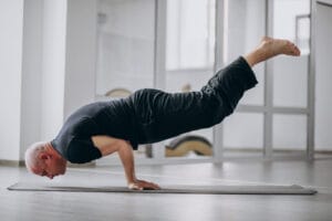 senior man practising yoga | balance exercise