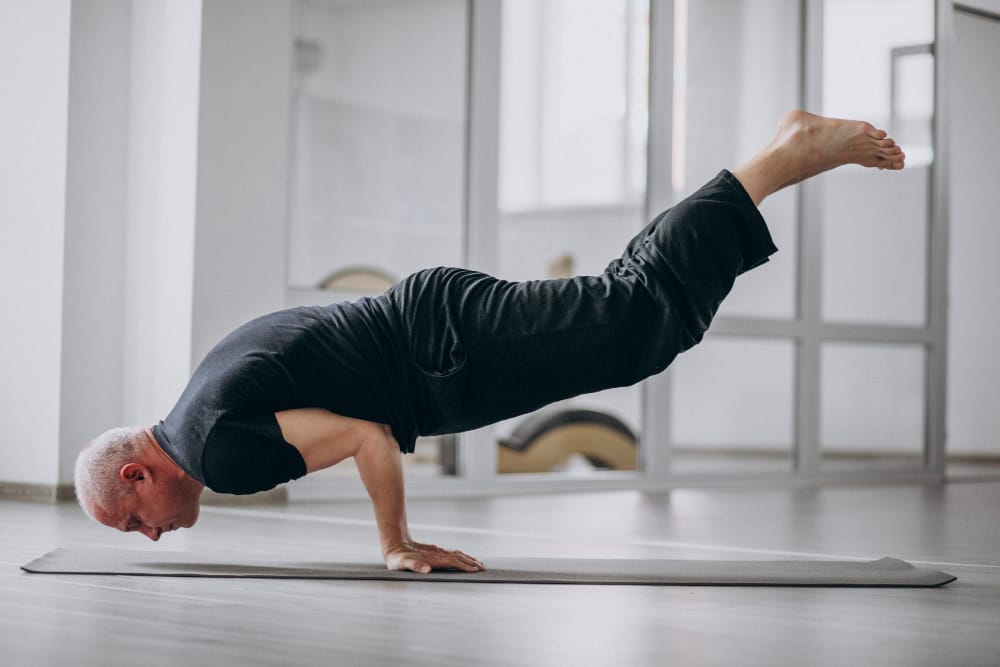 senior man practising yoga | balance exercise