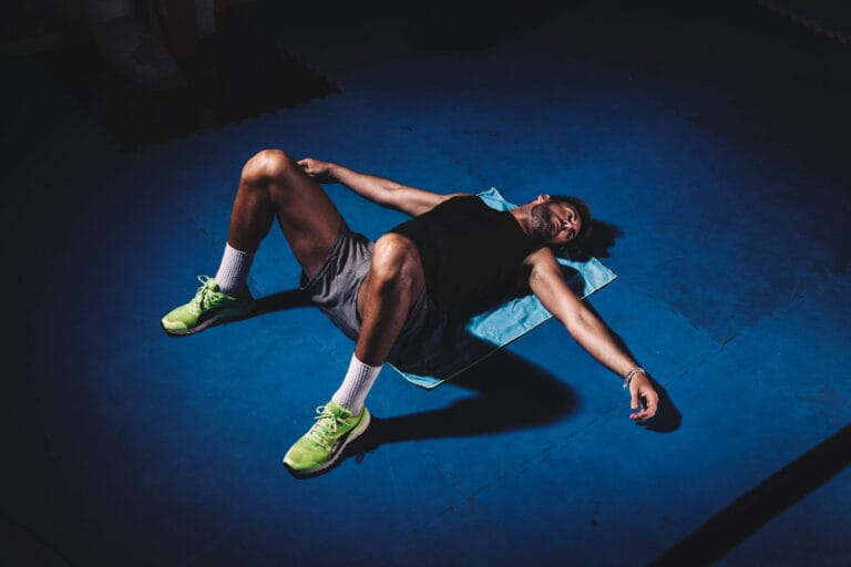 man passed out on the gym floor