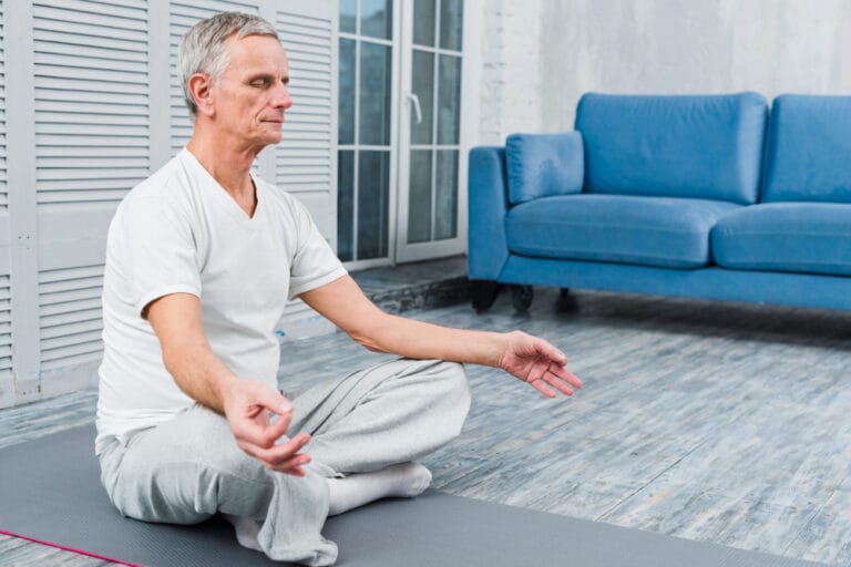 senior man meditating